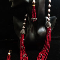 Pleasing and graceful necklace laden with exquisite work of wine colored crystals, beautiful high quality pearls