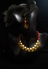 Pleasing and graceful Jaipur necklace laden with exquisite work of off white pearls .