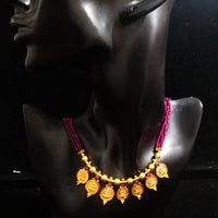 Pleasing and graceful gold plate-ted necklace laden with exquisite work of berry/wine purple colored crystals