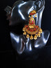 Classy Light Weight Red Colored multilayered Jumki Earring with delicate work of pearl and  Meenakari work.