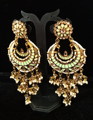 Classy Light Weight Pista green Colored multilayered Jumki Earring with delicate work of pearl and  Meenakari work.