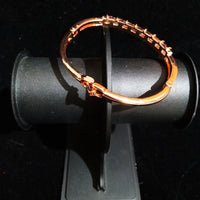 Gorgeous Copper Rose gold colored Bracelet with Jarkan Stones Studded .