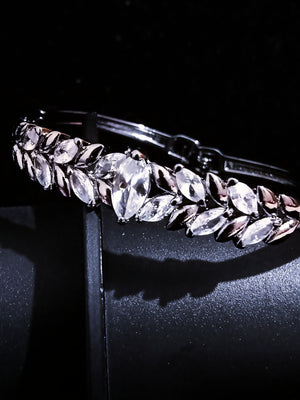 Gorgeous Platinum Colored Copper Bracelet with Jarkan Stones Studded .