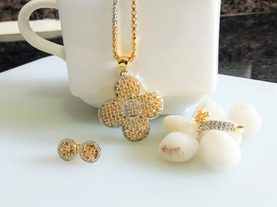 N075_Elegant Gold & Silver plated dual tone necklace set with earrings and ring studded with American Diamond stones.