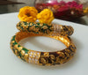 B042_Gorgeous Bangles crafted with delicate meena work with green and red zari combination studded with stones.