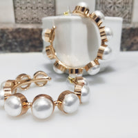 E0118_Classy premium pearl studded in golden half moon shaped ring earring.