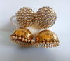 E0129_Gorgeous Golden color Meenakari jumkas studded with stones with a touch of pearls.