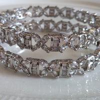 B055_ Classy Silver plated bangles studded with  American Diamond stones.
