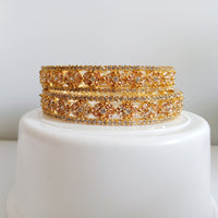 B065_Gorgeous Gold plated bangles  studded with  American Diamond  stones.