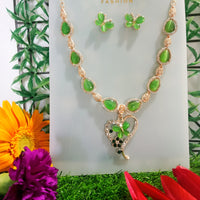 N091_Fancy necklace set studded  with a touch of  green colored stones.