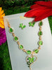 N091_Fancy necklace set studded  with a touch of  green colored stones.