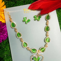 N091_Fancy necklace set studded  with a touch of  green colored stones.
