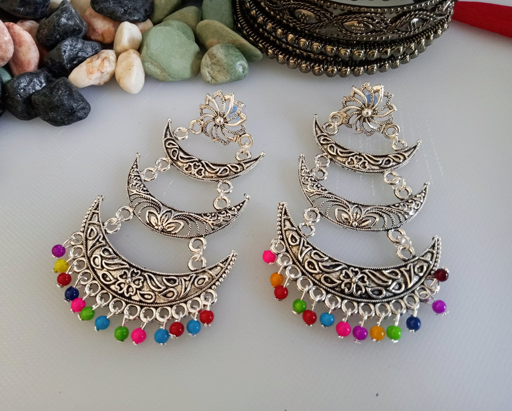 E0375_ Smashing German Silver oxidized  crafted moon shaped  layered earrings with multi color bead drops (medium size hangings).