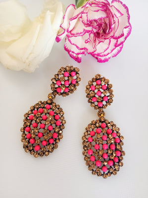 E0385_Classy Pink colored pearl embossed earrings (medium size).