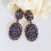 E0386_Classy Blue colored pearl embossed earrings (medium size).