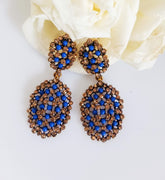E0386_Classy Blue colored pearl embossed earrings (medium size).