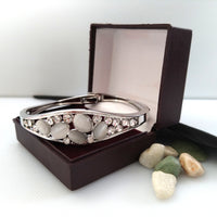 B0104_Elegant  metal base color  bracelet studded with  stones (Free size).