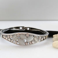 B0104_Elegant  metal base color  bracelet studded with  stones (Free size).