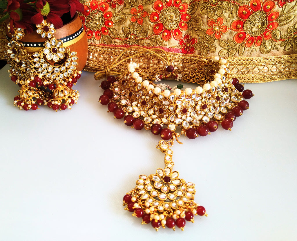 N0153_Classy Elaborated choker necklace set studded  with  Kundan stones with a touch of maroon beads & pearls.