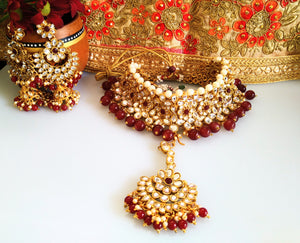 N0153_Classy Elaborated choker necklace set studded  with  Kundan stones with a touch of maroon beads & pearls.