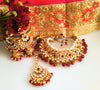 N0153_Classy Elaborated choker necklace set studded  with  Kundan stones with a touch of maroon beads & pearls.