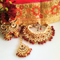 N0153_Classy Elaborated choker necklace set studded  with  Kundan stones with a touch of maroon beads & pearls.