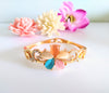 B0111_Elegant  metal base color flower design bracelet studded with  stones (Free size).