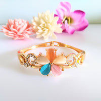 B0111_Elegant  metal base color flower design bracelet studded with  stones (Free size).