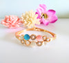 B0114_Elegant  metal base color  bracelet studded with multicolor stones (Free size).