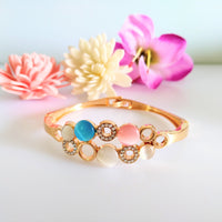 B0114_Elegant  metal base color  bracelet studded with multicolor stones (Free size).