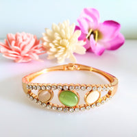 B0116_Elegant metal base color  bracelet studded with vibrant stones (Free size).