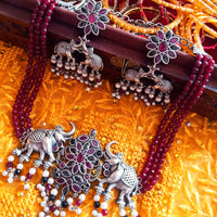 N0155_Exquisite pure German silver Oxidized necklace set studded with pink & black ruby stones with a touch of magenta crystals & pearls.