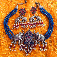 N0157_Exquisite pure German silver Oxidized necklace set studded with blue & pink ruby stones with a touch of blue crystals & pearl drops.
