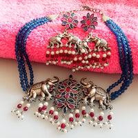 N0157_Exquisite pure German silver Oxidized necklace set studded with blue & pink ruby stones with a touch of blue crystals & pearl drops.