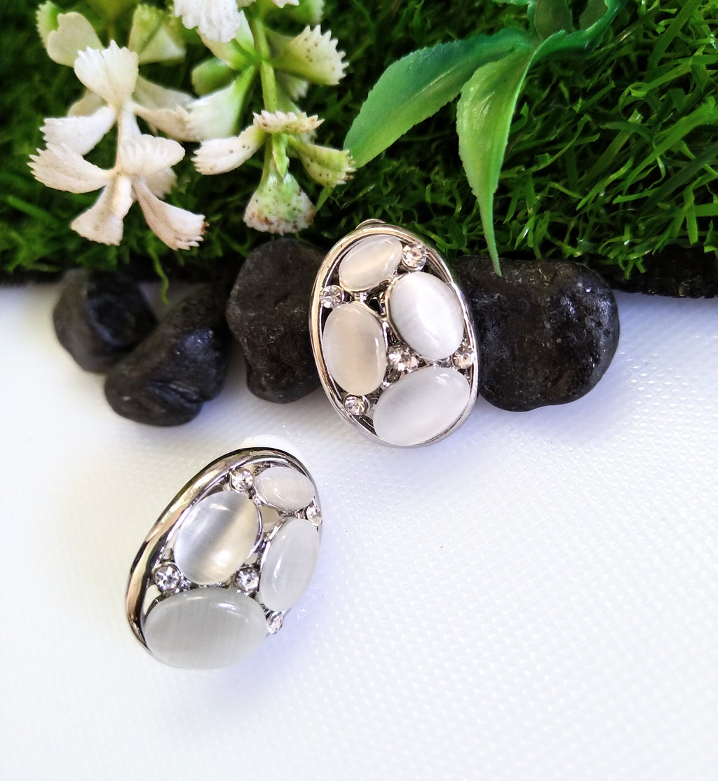 E0417_Classy studs studded with grey & white color stones with touch of metal base.
