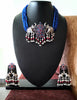 N0157_Exquisite pure German silver Oxidized necklace set studded with blue & pink ruby stones with a touch of blue crystals & pearl drops.
