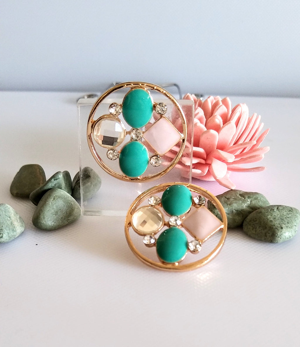 E0414_Classy circular shaped stud with a touch of ocean green & pale pink stones.