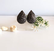E0412_Classy stud teardrop shaped earring with touch of black color stones.