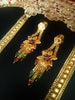 N0176_Ravishing traditional style Gold plated long layered grand necklace set with fine artwork of floral designs studded with pink and green ruby stones with a touch of broad chain drop pendant.