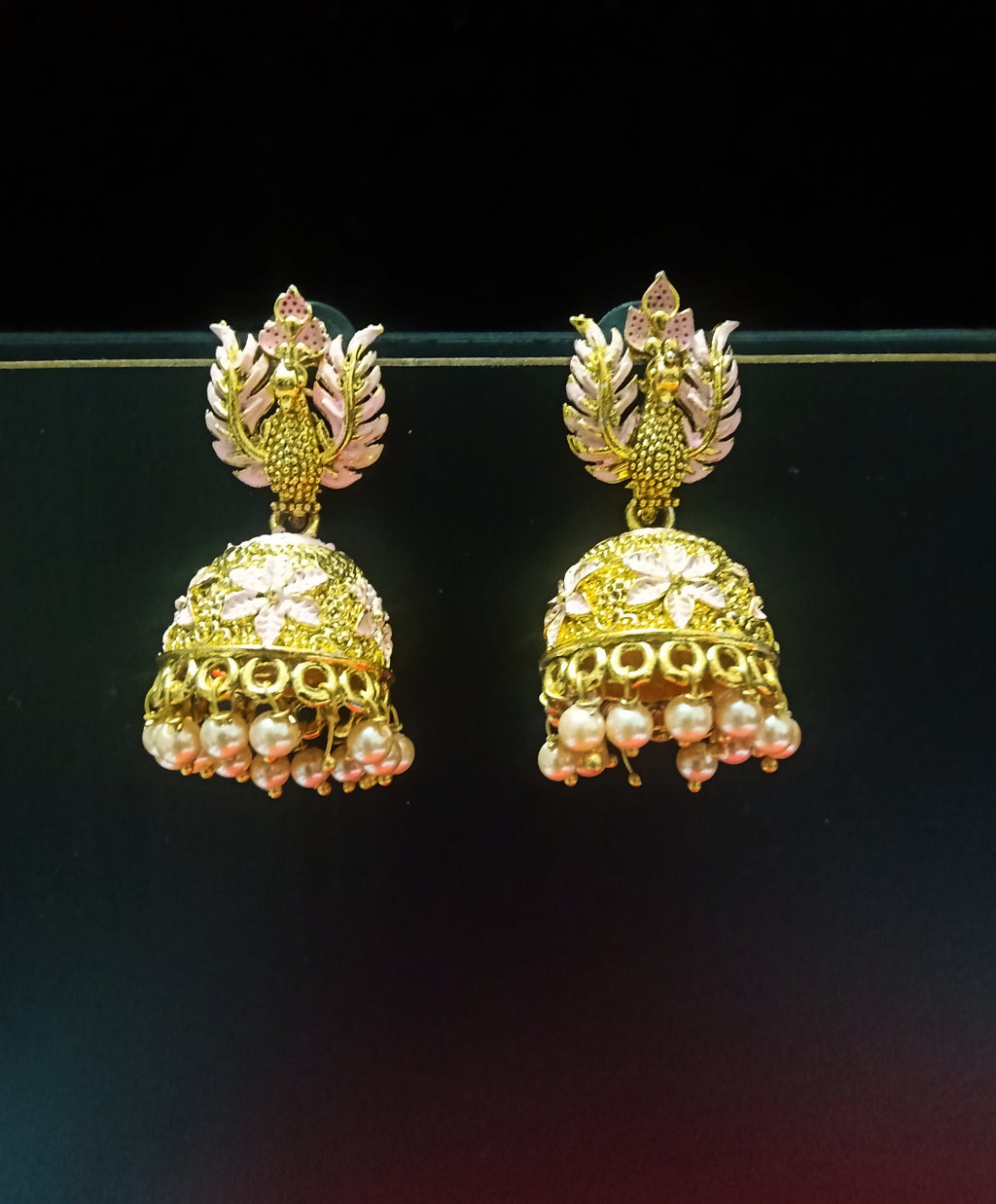 E0802_Gorgeous pink & golden color jumkas with delicate peacock design with a touch of pearl drops.