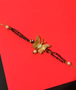 N0182_Elegant style bracelet with beautiful butterfly design pendant  with a touch of pearls.