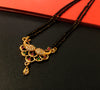 N0183_Elegant style mangalsutra with beautiful peacock design pendant studded with American Diamond stones with a touch of pink and green ruby stones.