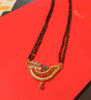 N0184_Elegant style mangalsutra with beautiful leafy design pendant studded with American Diamond stones with a touch of pink and green ruby stones.