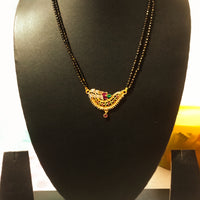 N0184_Elegant style mangalsutra with beautiful leafy design pendant studded with American Diamond stones with a touch of pink and green ruby stones.