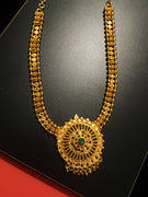 N0189_Elegant Micro Gold plated Necklace with delicate work of broad circular pendant studded with Precious green ruby stones with a touch of golden bead drops.
