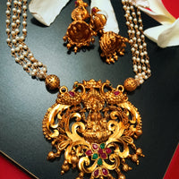 N068_Gorgeous matte Gold polish Temple jewelry design Lakshmi pendant  necklace studded with pink and green ruby stones followed by small pearls.