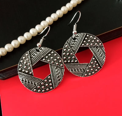 E0520_ Lovely German Silver oxidized crafted disc shaped earring with delicate art work (medium size).