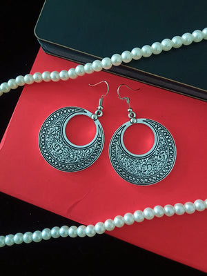 E0518_ Classy German Silver oxidized crafted disc shaped earring (medium size).