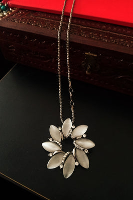N0215_Classic German Silver Oxidized necklace with shiny floral pendant with delicate work of stones.