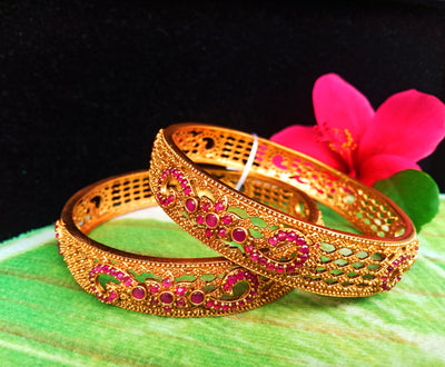 B0118_Classic Style one gram gold Plated along with pink ruby studded Bangles for Women Set of 2.